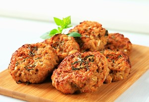 Fried vegetable burgers on cutting board